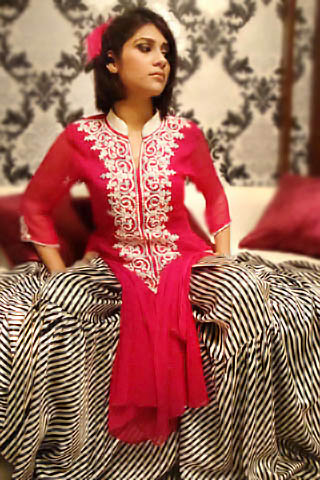 Hot red top by Xenab Ansari