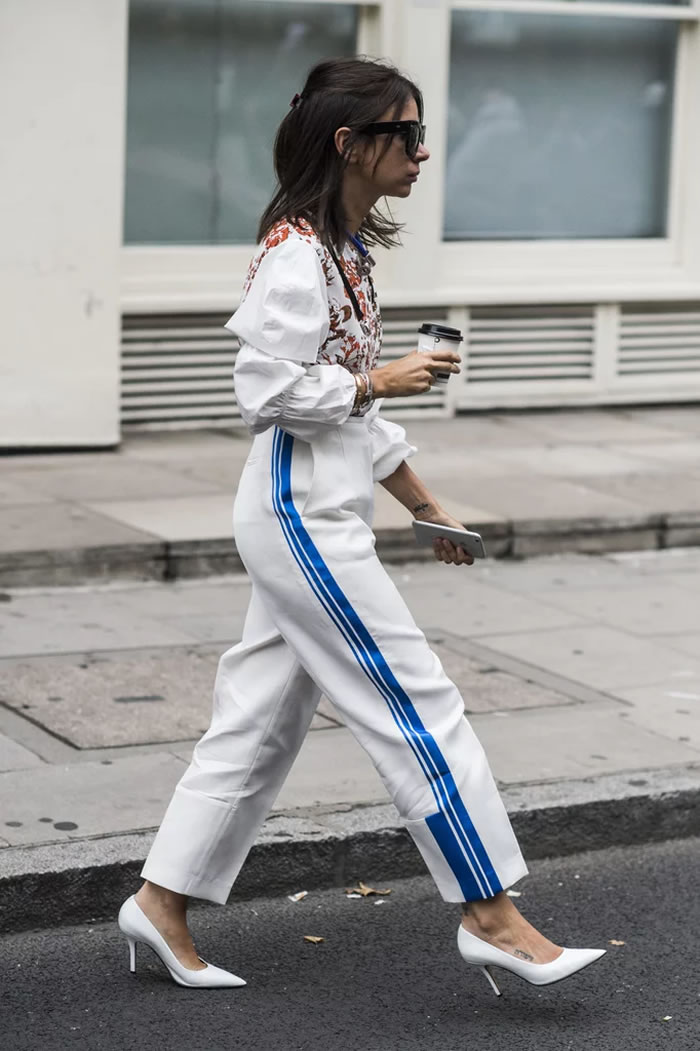 With a Feminine Blouse Tucked in Tight and Power Pumps