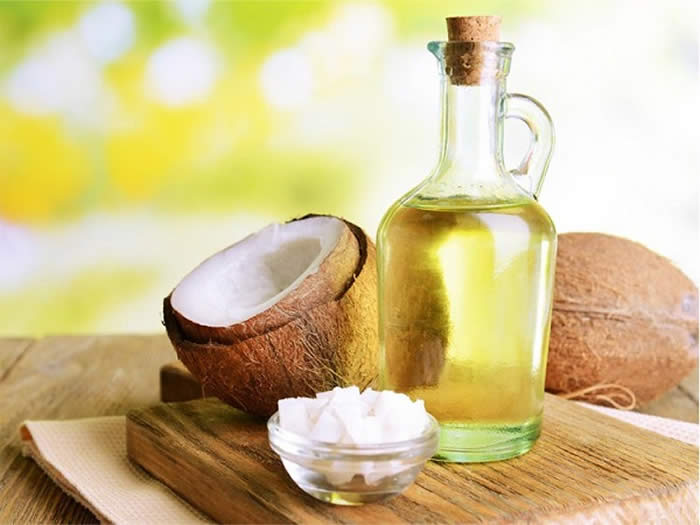 Coconut Oil massage for thicker and longer hair