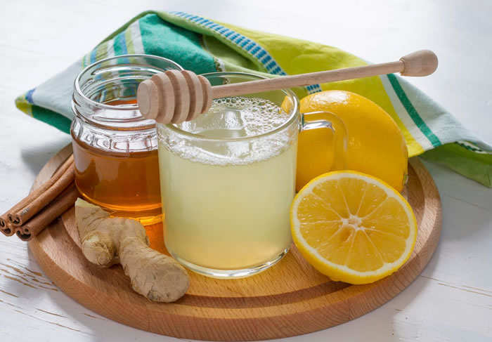 Natural waxing with honey and lemon for removing upper lip hair