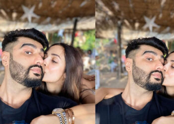 Malaika Arora Plants A Kiss Of Love On Boyfriend Arjun Kapoor